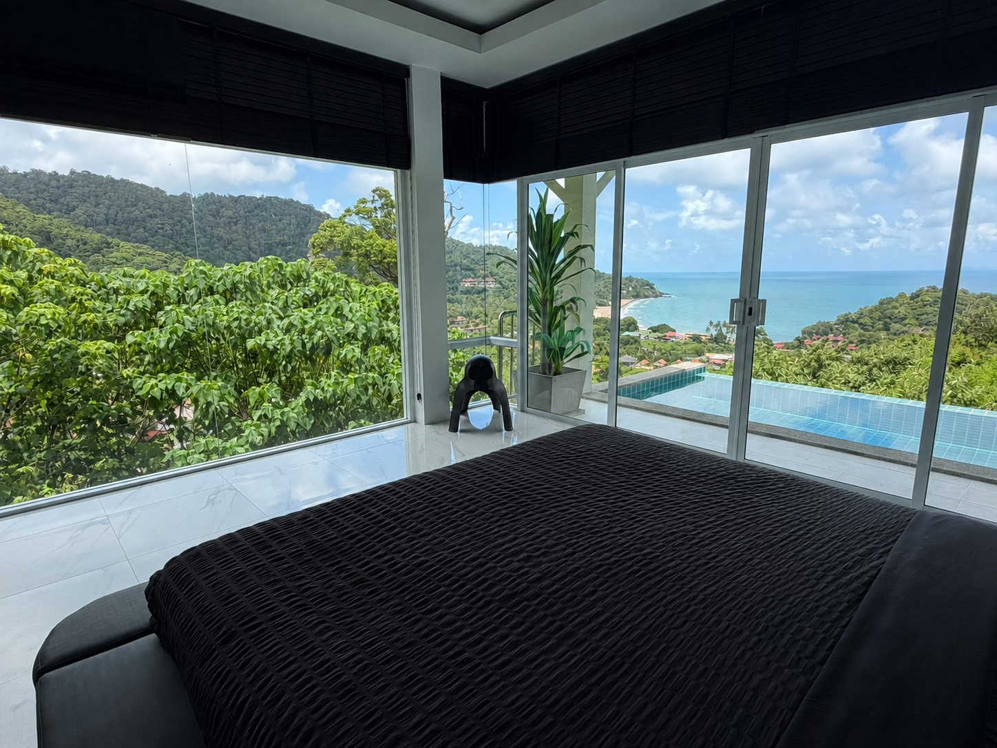 Bedroom 1 with panoramic sea and pool view